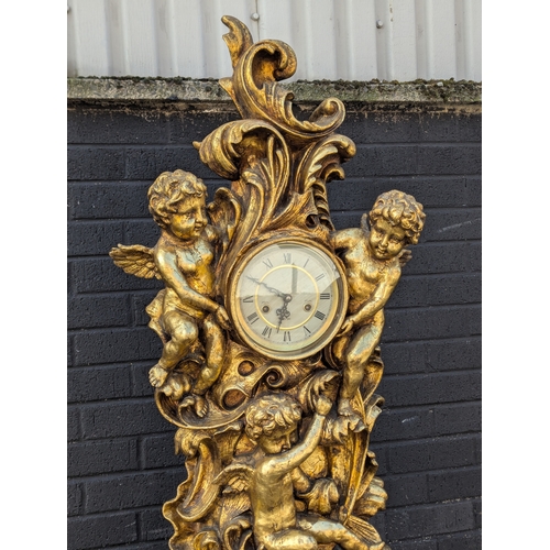 63 - Gilt cherub grandfather clock, 200cm