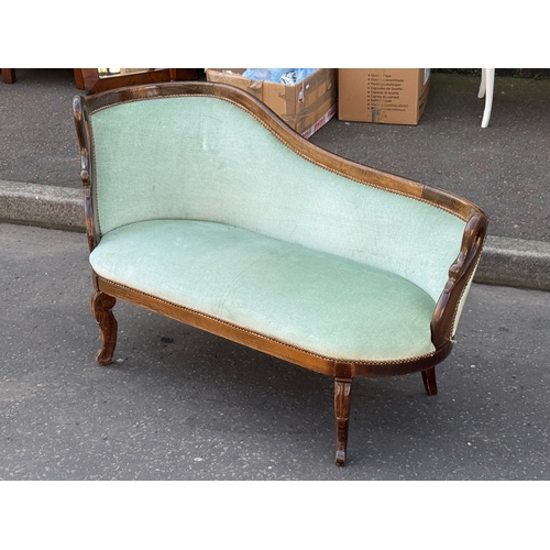 76 - A French style sofa. 133cm
