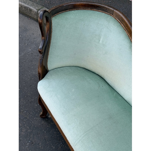 76 - A French style sofa. 133cm