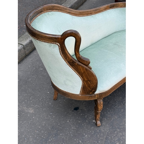 76 - A French style sofa. 133cm