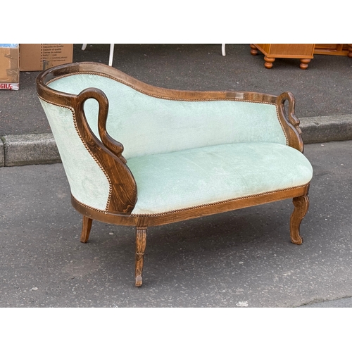 76 - A French style sofa. 133cm