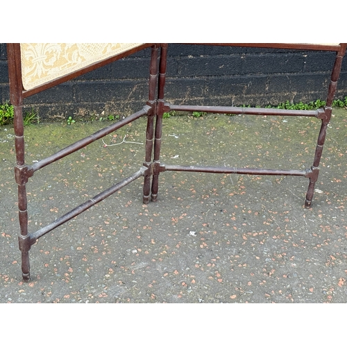 78 - An Edwardian mahogany framed two tier screen. 91x110cm.
