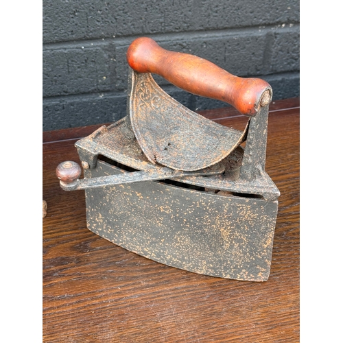 296 - Cast iron scales and irons.