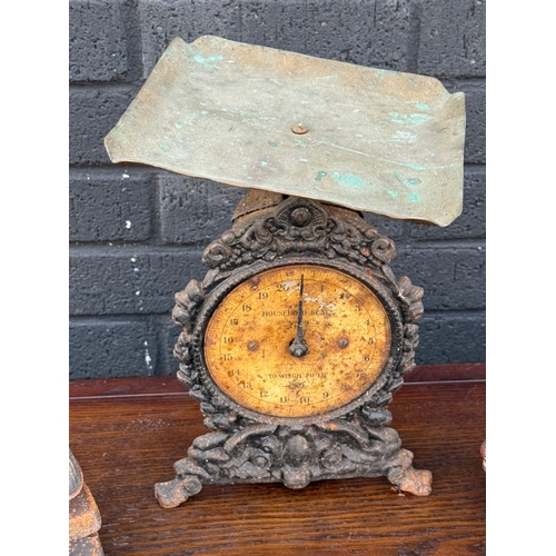 296 - Cast iron scales and irons.