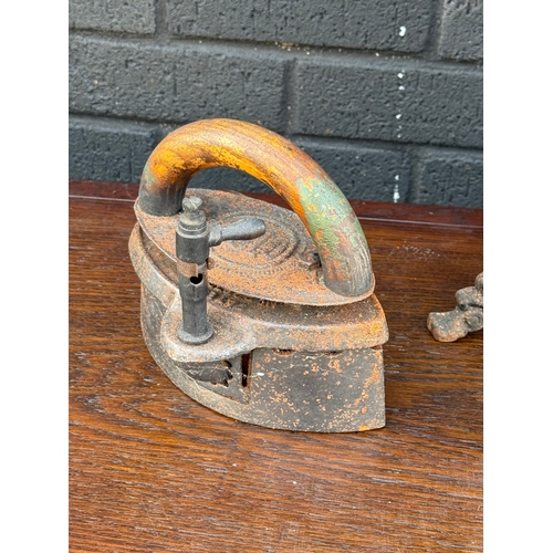 296 - Cast iron scales and irons.