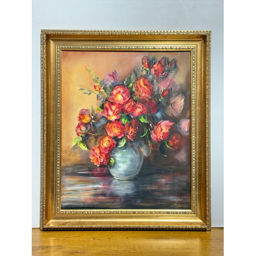 240 - A still life oil on canvas. Signed Cartney. Frame 63.5x75cm.
