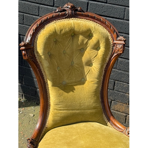 102 - A Victorian walnut ladies chair