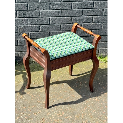 371 - An Edwardian piano stool.