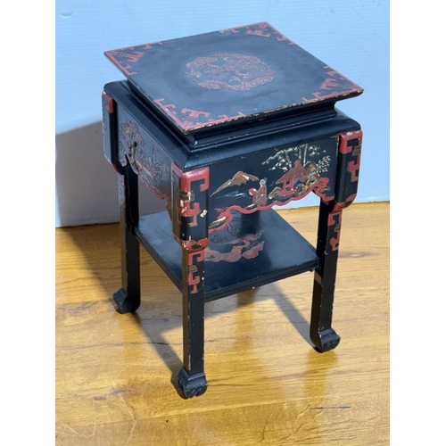 245 - A Japanese lacquered plantstand. Mid 20th century. 22x22x36cm.