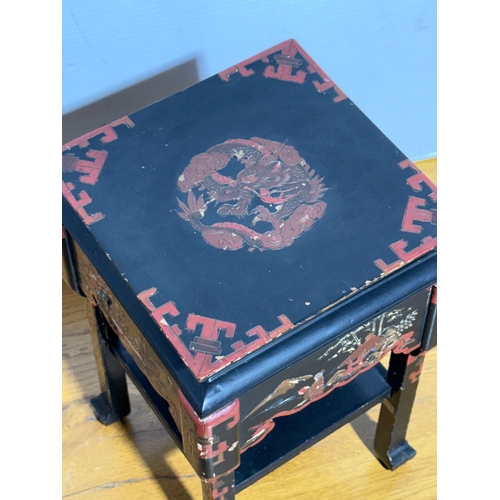 245 - A Japanese lacquered plantstand. Mid 20th century. 22x22x36cm.