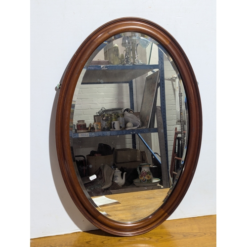 247 - Vintage mahogany framed bevelled mirror, 57x83cm