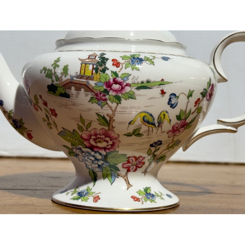 403 - A Staffordshire Fine Bone China Pagoda teapot. 26x16x19.