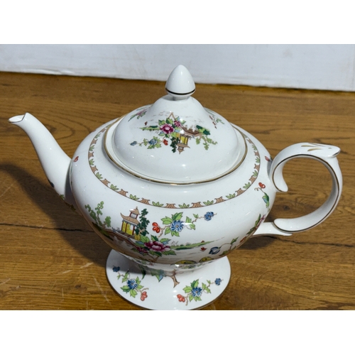 403 - A Staffordshire Fine Bone China Pagoda teapot. 26x16x19.