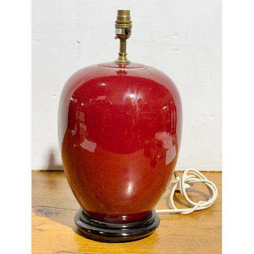 83 - A Chinese Sang de Boeuf table lamp. 22x43cm.