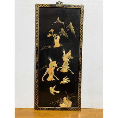 256 - A Japanese wall plaque. 40.5x92cm.