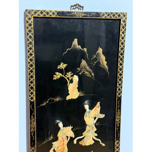 256 - A Japanese wall plaque. 40.5x92cm.