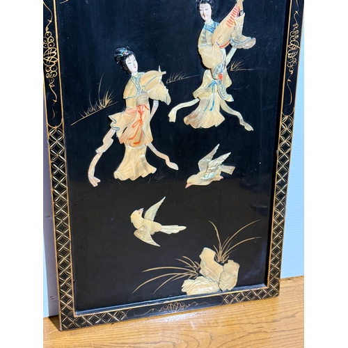 256 - A Japanese wall plaque. 40.5x92cm.