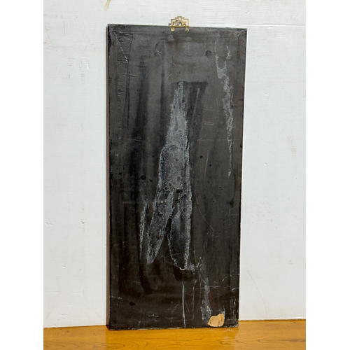256 - A Japanese wall plaque. 40.5x92cm.