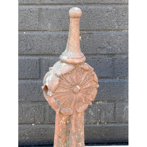 88 - Three early 20th century cast iron fence bollards. 50cm.
