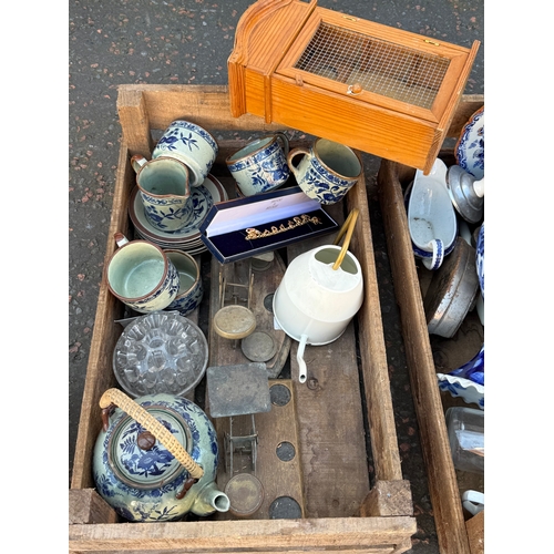 407 - Four potato crates and contents.
