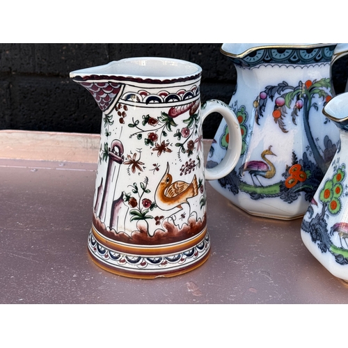 408 - Quantity of jugs. Keeling & Co Losol Ware Exotic etc.