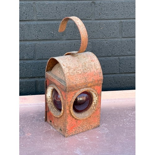 412 - A vintage railway lamp.