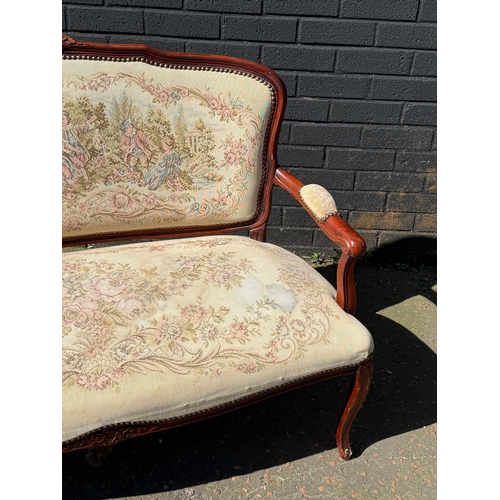 414 - A French style two seater sofa. 122.