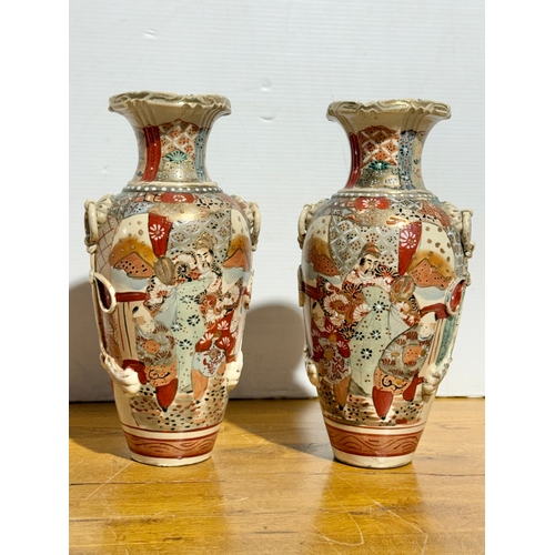 367 - A pair of Japanese Satsuma vases. Late Meiji Period. 31cm.