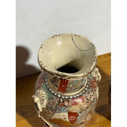 367 - A pair of Japanese Satsuma vases. Late Meiji Period. 31cm.