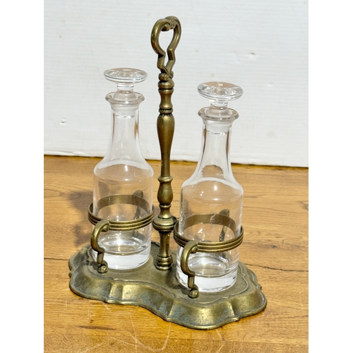 368 - Vintage glass oil and vinegar bottles on stand. 20x12x25cm.