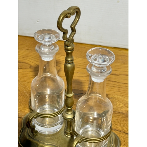 368 - Vintage glass oil and vinegar bottles on stand. 20x12x25cm.