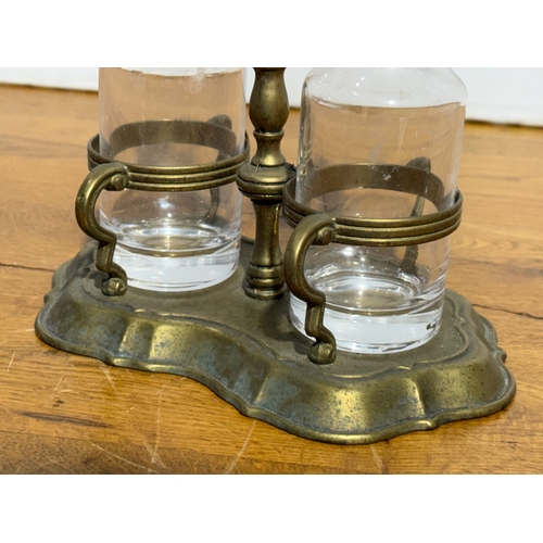 368 - Vintage glass oil and vinegar bottles on stand. 20x12x25cm.