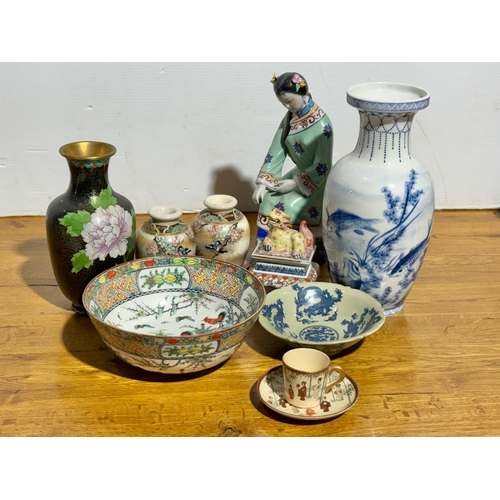 377 - A quantity of Chinese and Japanese pottery, including a cloisonné vase.