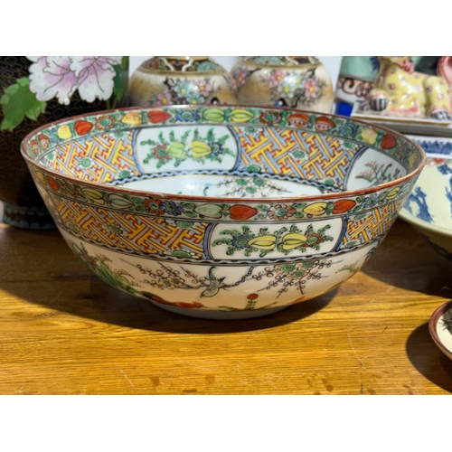 377 - A quantity of Chinese and Japanese pottery, including a cloisonné vase.