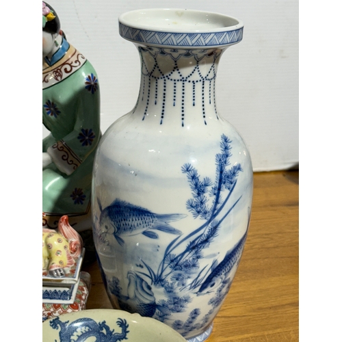 377 - A quantity of Chinese and Japanese pottery, including a cloisonné vase.