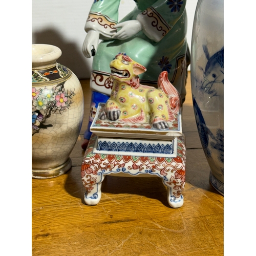 377 - A quantity of Chinese and Japanese pottery, including a cloisonné vase.