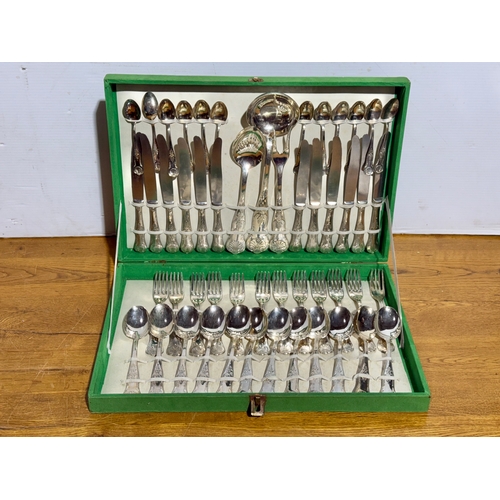 418 - A large canteen of cutlery. 48.5x32.5x6.5cm.