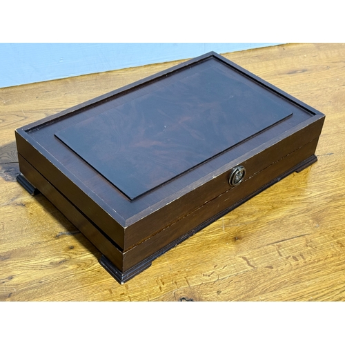 104 - A large canteen of cutlery. 49.5x32x11cm.
