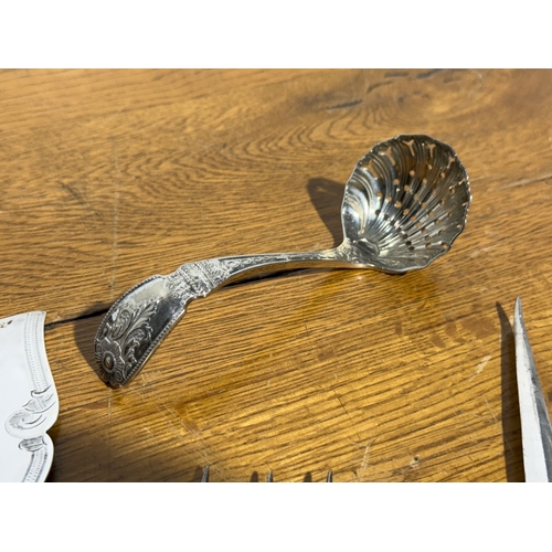 382 - Victorian cutlery. Elkington & Co meat skewers, silver plated sugar sifter, carving set etc.