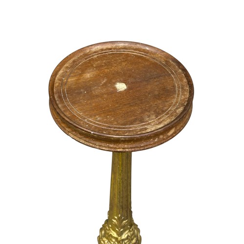 99 - A pair of Victorian gilded cast iron pedestal tables with mahogany tops. 36x70.5cm.
