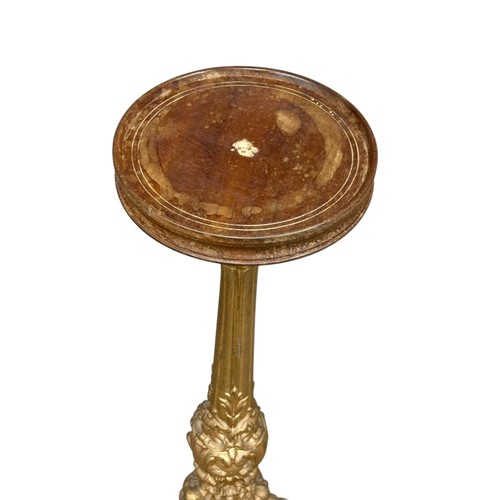 99 - A pair of Victorian gilded cast iron pedestal tables with mahogany tops. 36x70.5cm.