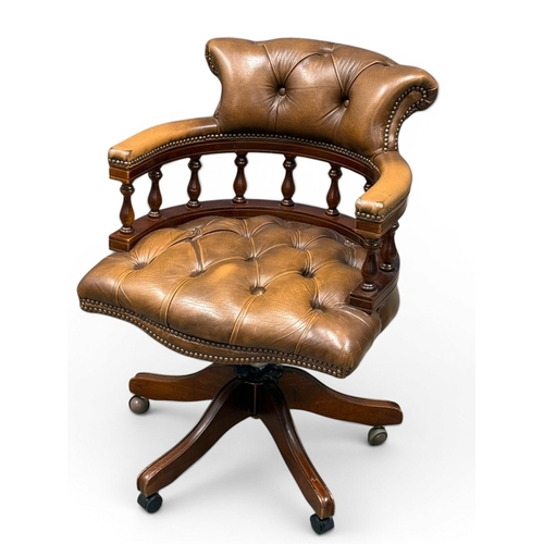 191 - A Victorian Style Deep Button Leather Swivel Desk Chair.
