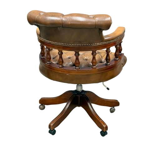 191 - A Victorian Style Deep Button Leather Swivel Desk Chair.