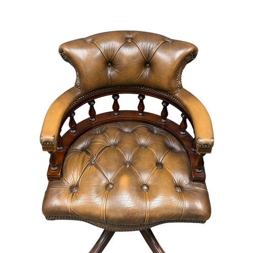 191 - A Victorian Style Deep Button Leather Swivel Desk Chair.