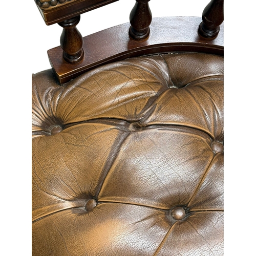 191 - A Victorian Style Deep Button Leather Swivel Desk Chair.