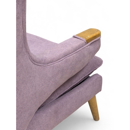 176 - A 1950’s Swedish Papa Bear Style Armchair. In the manner of Hans J Wegner. Reupholstered. (6)