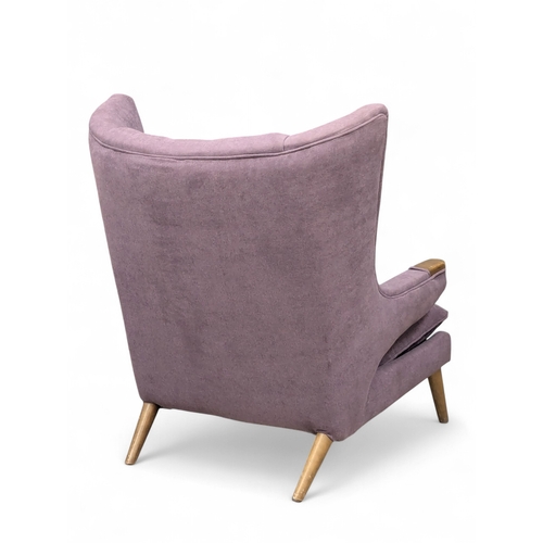 176 - A 1950’s Swedish Papa Bear Style Armchair. In the manner of Hans J Wegner. Reupholstered. (6)