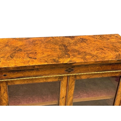 209 - A Victorian Inlaid Burr Walnut Display Cabinet. C.1850-60, Mid 19th Century. With gilt metal mouldin... 