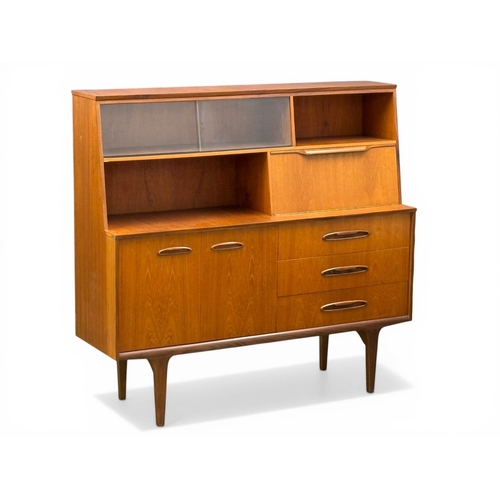 188 - Jentique, C.1960. A Teak Cocktail Sideboard. 138x42x128cm. 5