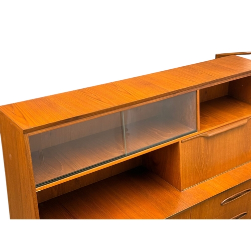 188 - Jentique, C.1960. A Teak Cocktail Sideboard. 138x42x128cm. 5